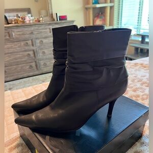 Carlos Santana boots hung up